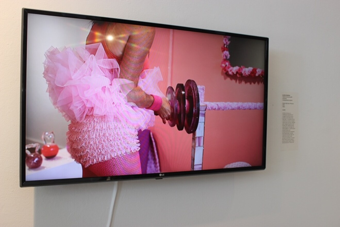 In the free exhibit at the Morean Arts Center, student artist Jennifer Detlefsen recorded a video of her interacting with objects she made from glass, like these barbels.